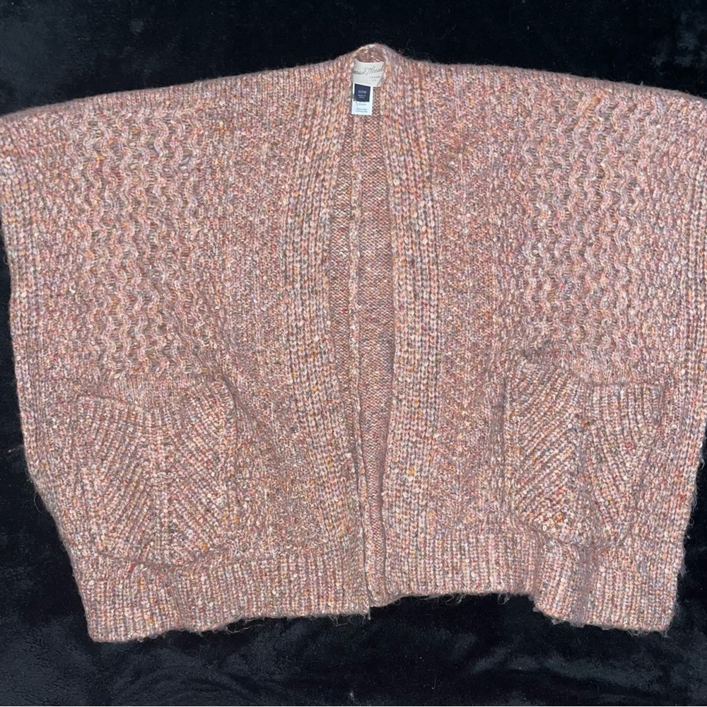 Cute shawl great for layering.